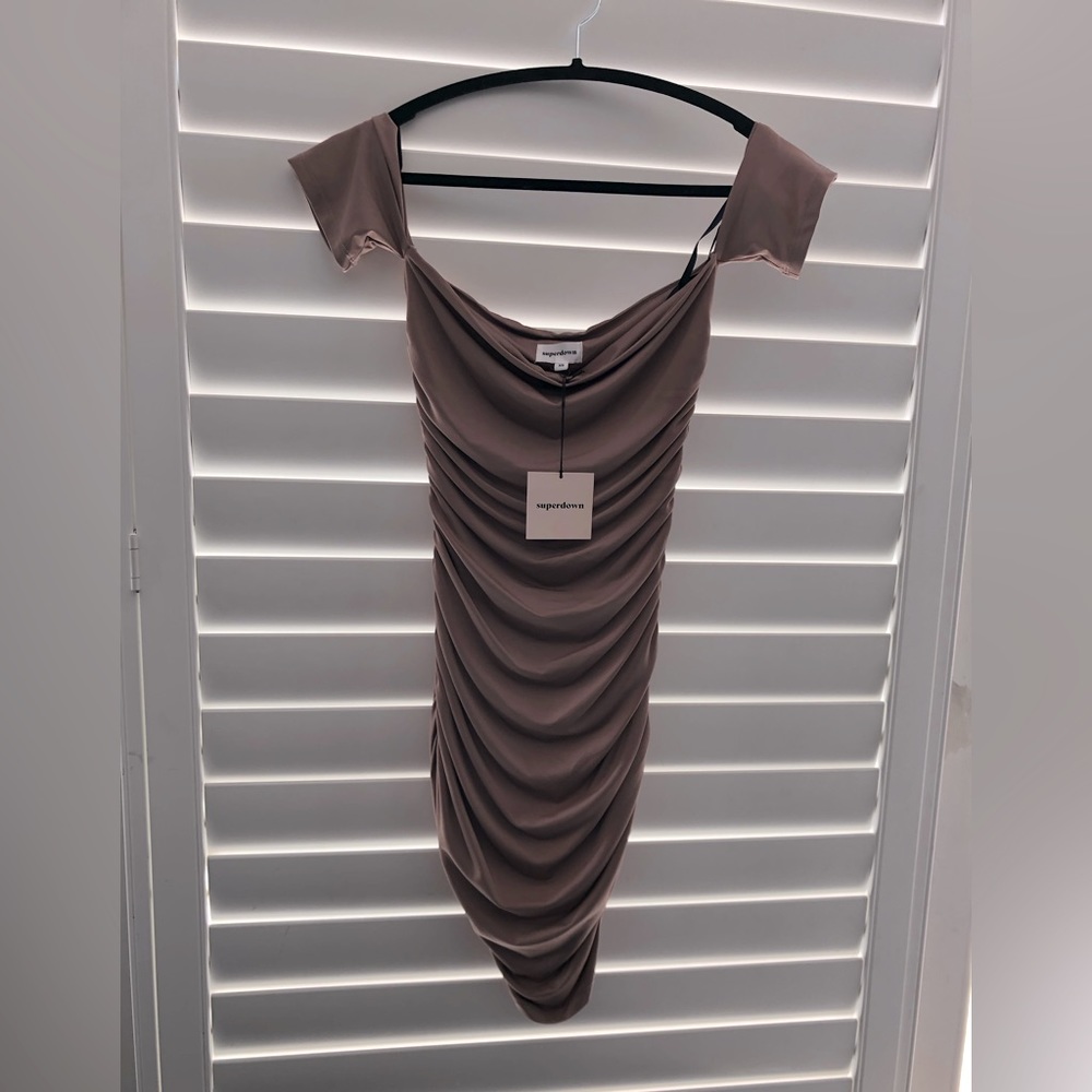 Super down side ruched mini dress. Size XS